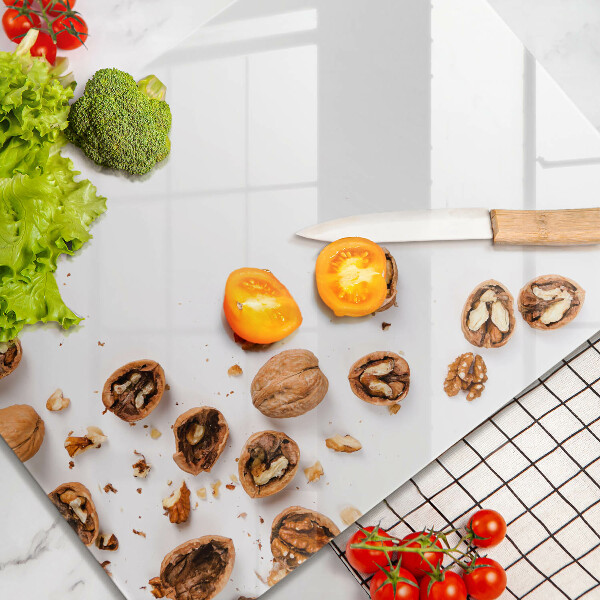 Steklena podloga za rezanje Orehi na belem ozadju