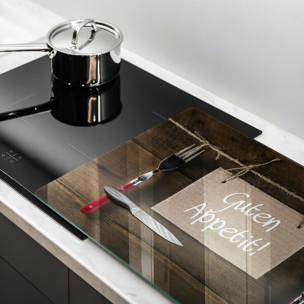 Steklena podloga za rezanje Napis Guten Appetit na lesenih deskah