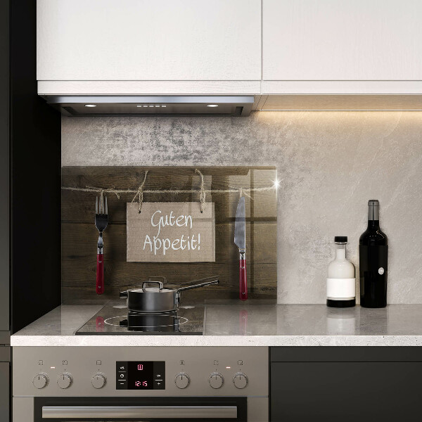 Steklena podloga za rezanje Napis Guten Appetit na lesenih deskah