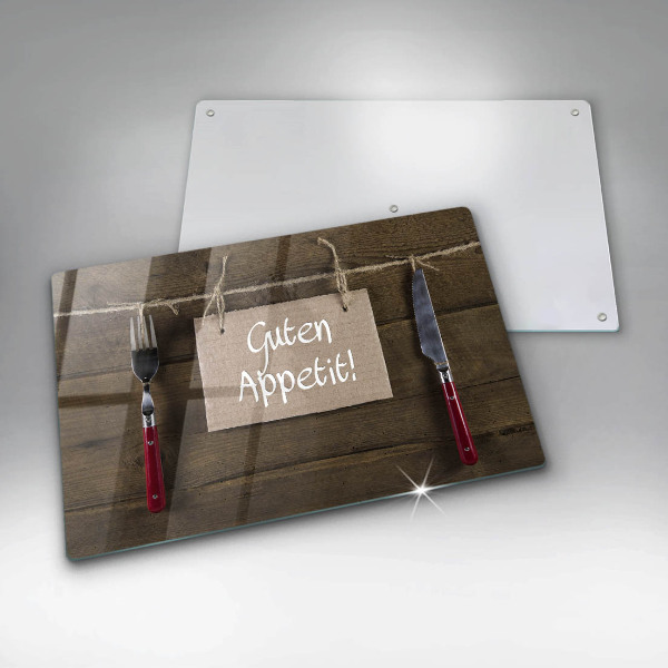 Steklena podloga za rezanje Napis Guten Appetit na lesenih deskah