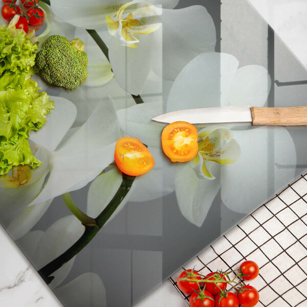 Steklena podloga za rezanje Cvetovi belih orhidej